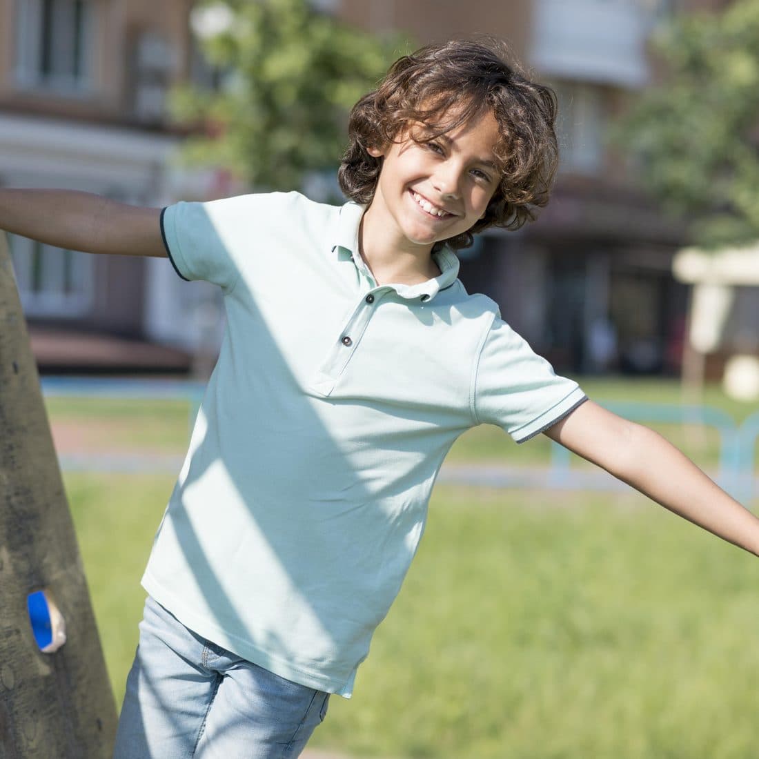 A child smiling after a Vitalfitness Kids session